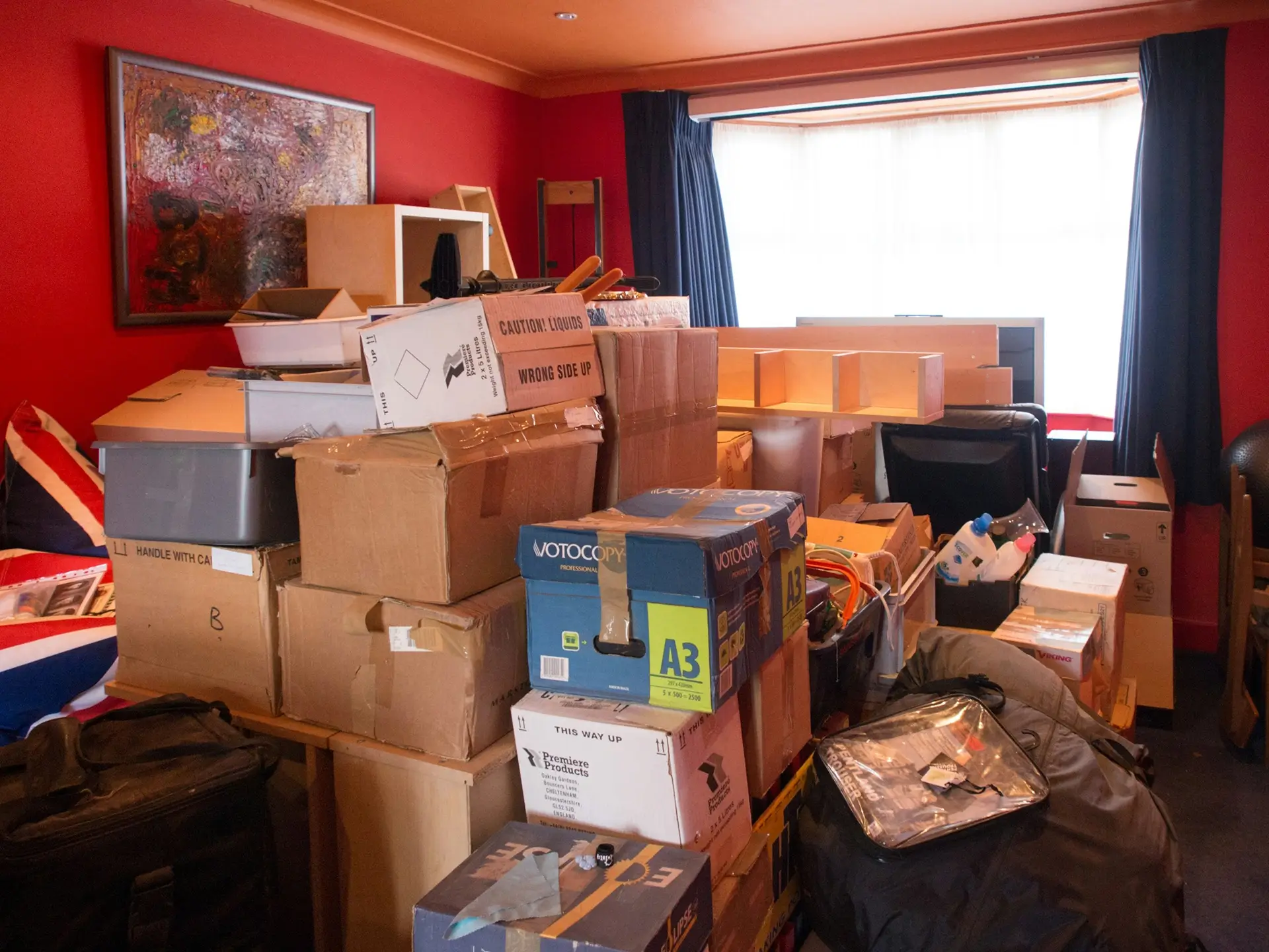 Small student move in Bedford with packed moving boxes